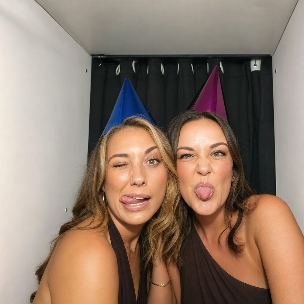 Two friends in the oval pod at a birthday party